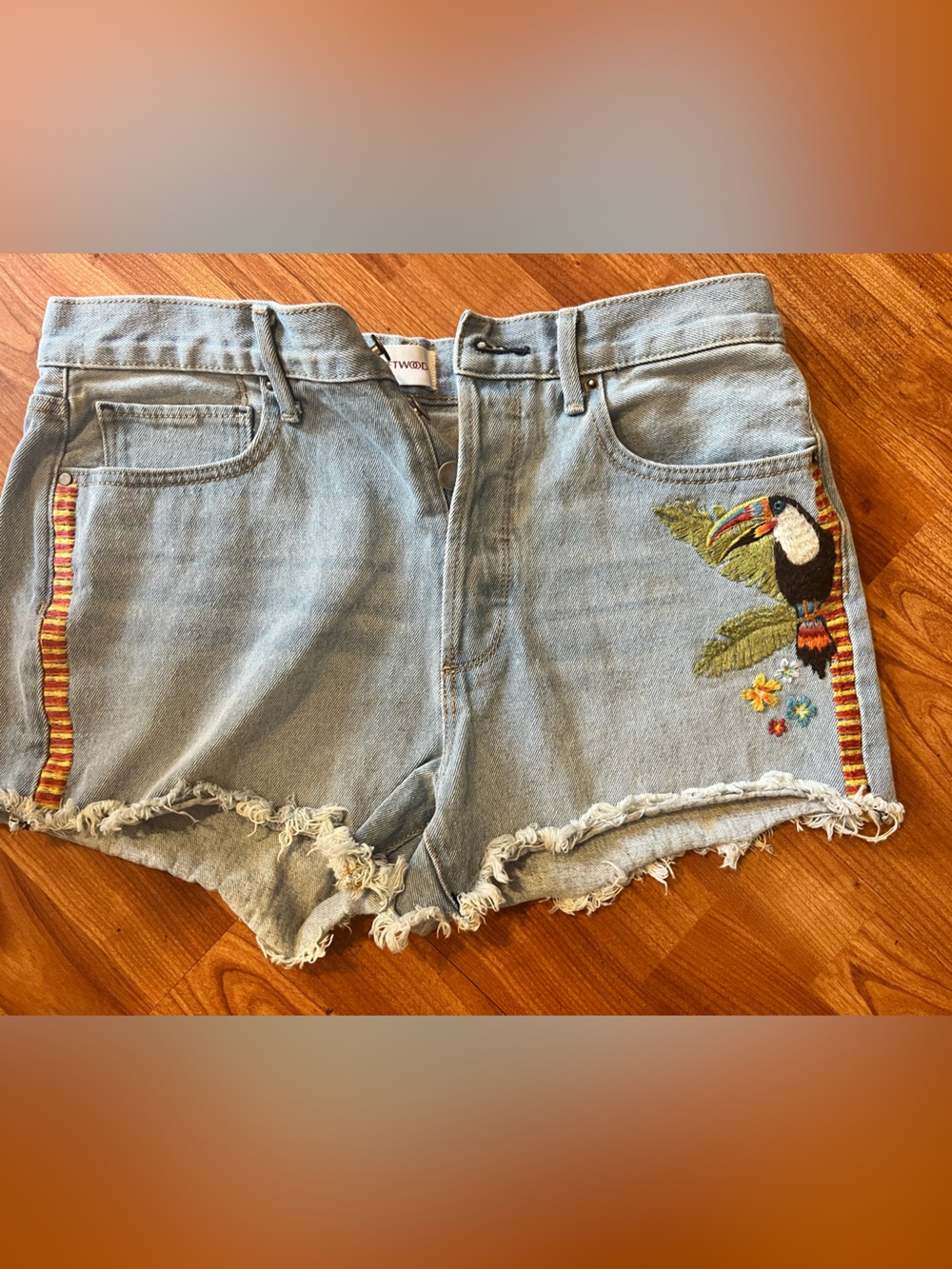 DRIFTWOOD Light Blue Denim Shorts with Embroidered Toucan and Striped Trim